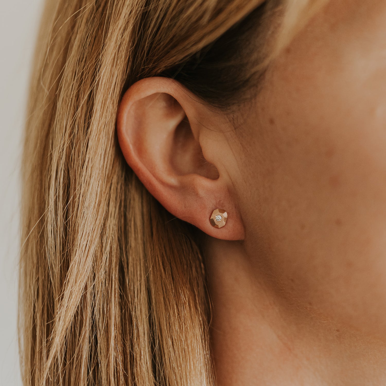 ROSE GOLD FACETED DIAMOND STUDS BY CORKIE BOLTON JEWELRY