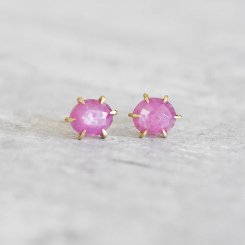 18k yellow gold prong studs with Pink Sheen Sapphires.