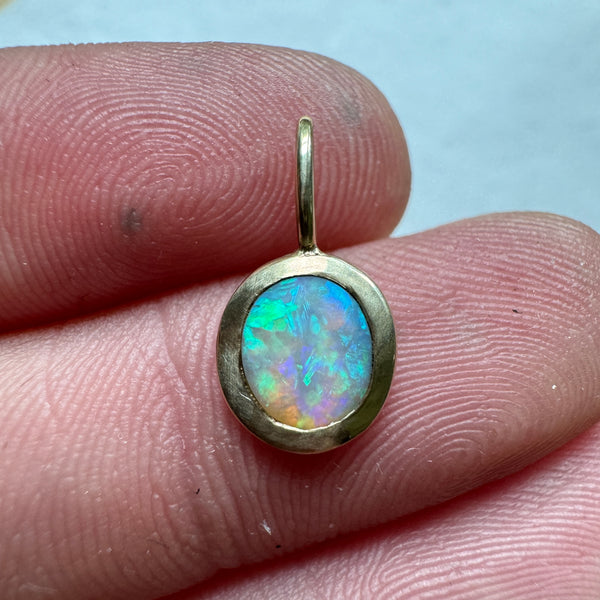 Ancients 17 matte australian opal gold charm by Corkie Bolton Jewelry.