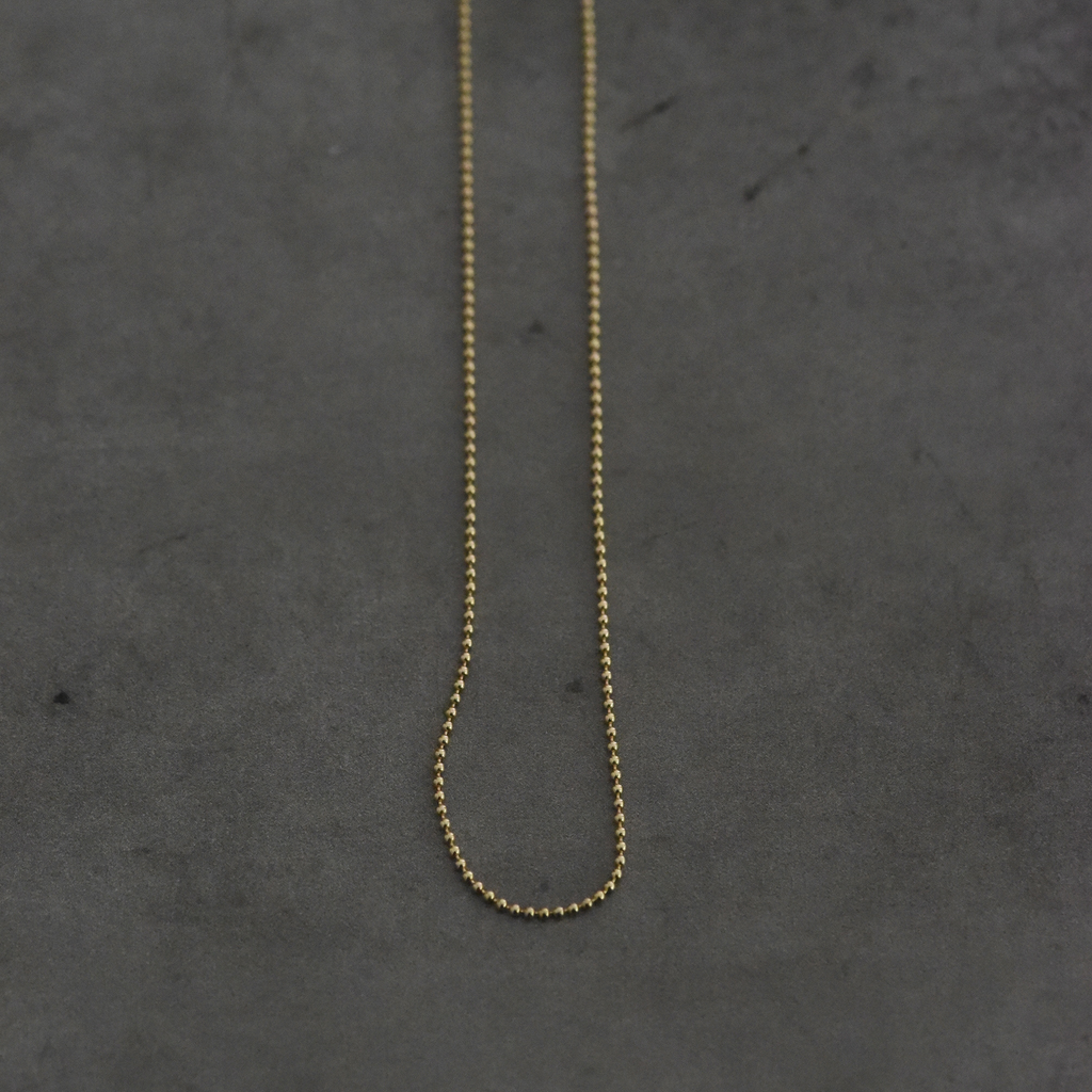 Solid 14k yellow gold delicate ball chain.