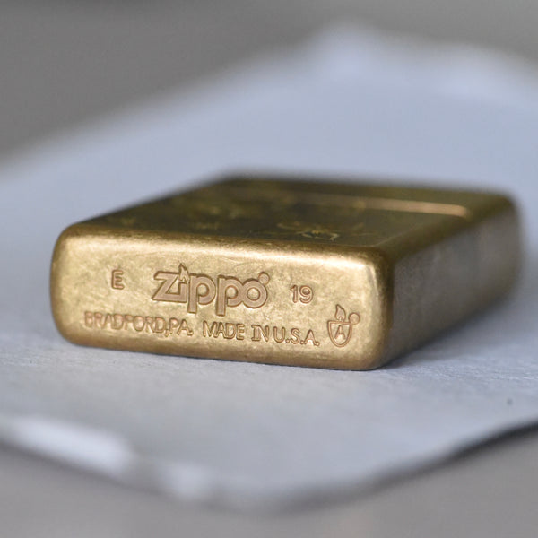 Hand engraved brass zippo lighter by Corkie Bolton Jewelry