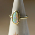 Australian opal 18k yellow gold ring with accent diamond by Corkie Bolton Jewelry.