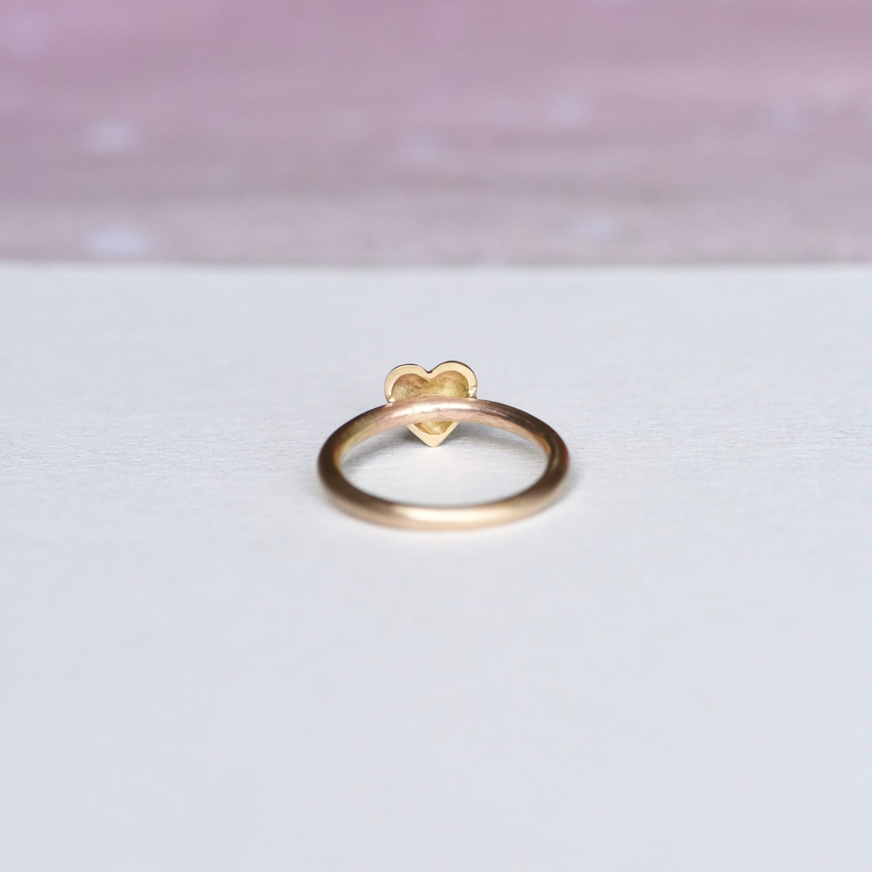 Detailed shot of the ring's underside, revealing the craftsmanship and finishing touches.