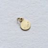 Backside of 18k yellow gold charm by Corkie Bolton Jewelry.