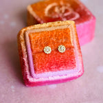 Funfetti Engraved Diamond studs shown worn or styled, emphasizing their size and sparkle for everyday wear.