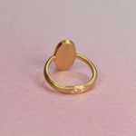Backside of the Australian Opal Ring showing a hidden detail, a hand engraved diamond setting in the back of the band.