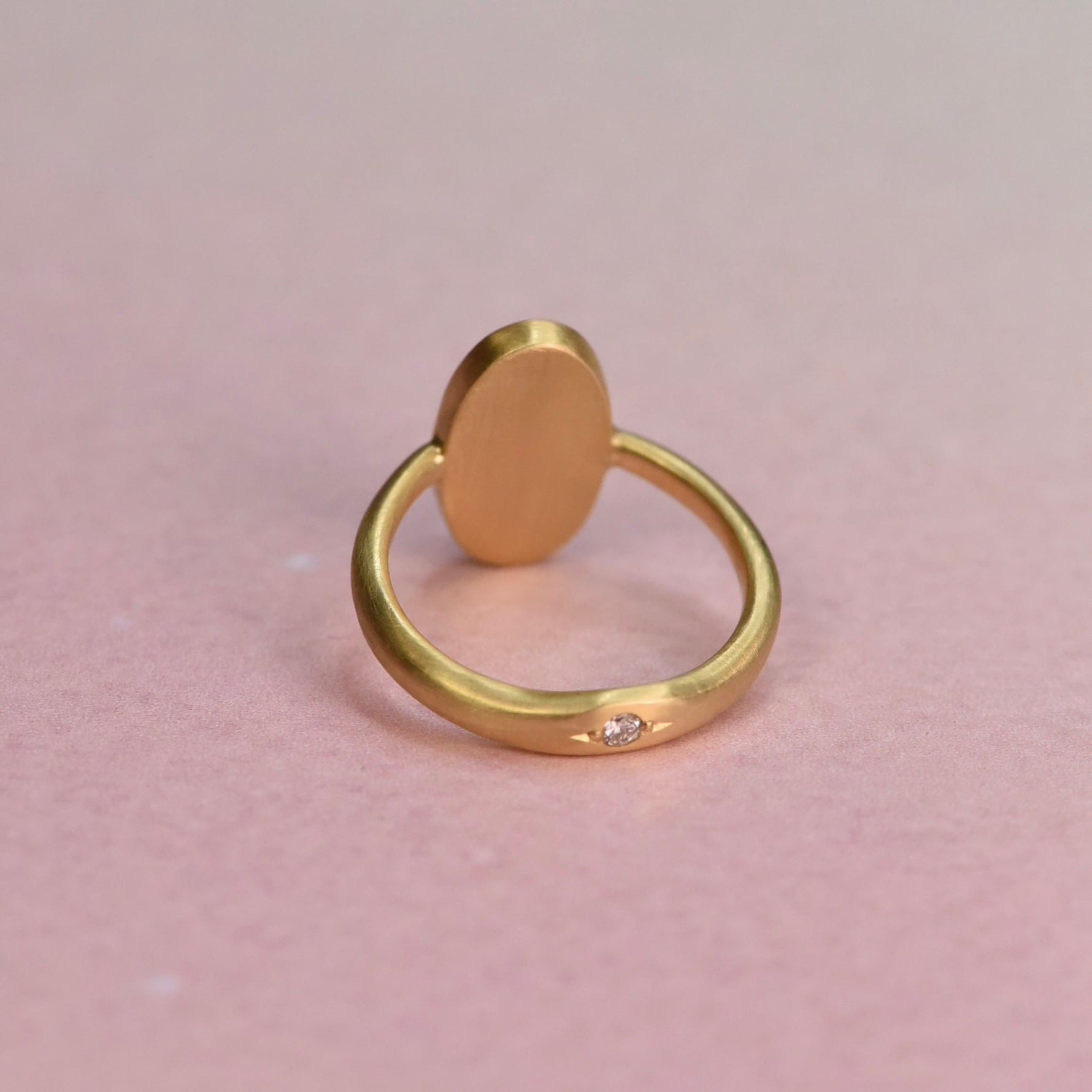 Backside of the Australian Opal Ring showing a hidden detail, a hand engraved diamond setting in the back of the band.