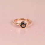 Teal sapphire in a hand fabricated 14k yellow gold bezel on a 2mm 10k yellow gold flat band ring, size 5.5