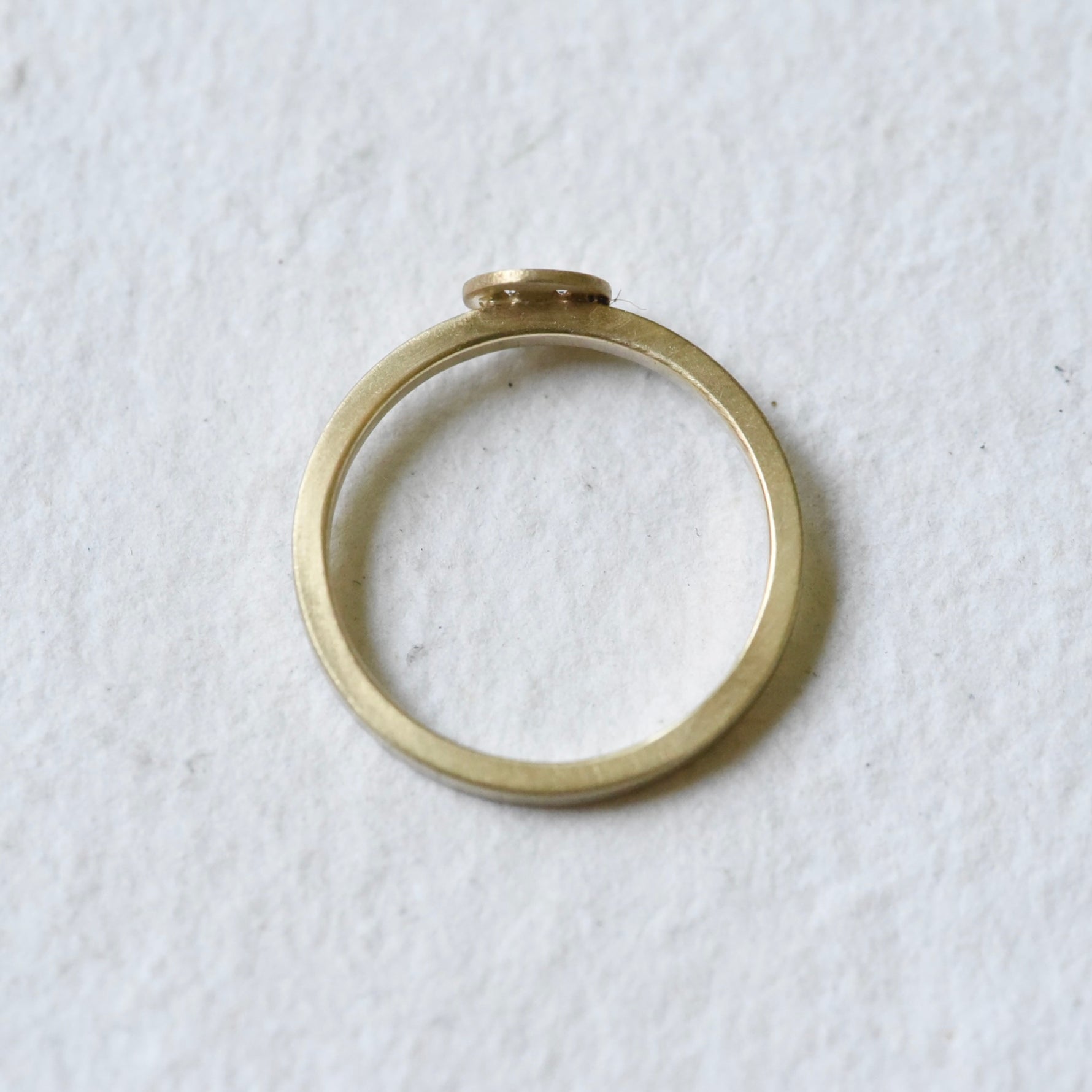 Top View Smile 10K Diamond Ring on a white background