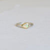 Australian Opal Teardrop Ring on a white background, featuring a vibrant teardrop-shaped opal set in a 14k gold bezel with a satin finish band