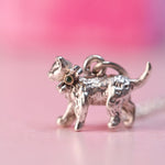 Vintage Beaucraft kitten charm necklace from the 1940s with green diamond set in 14k yellow gold on an 18 inch sterling silver chain