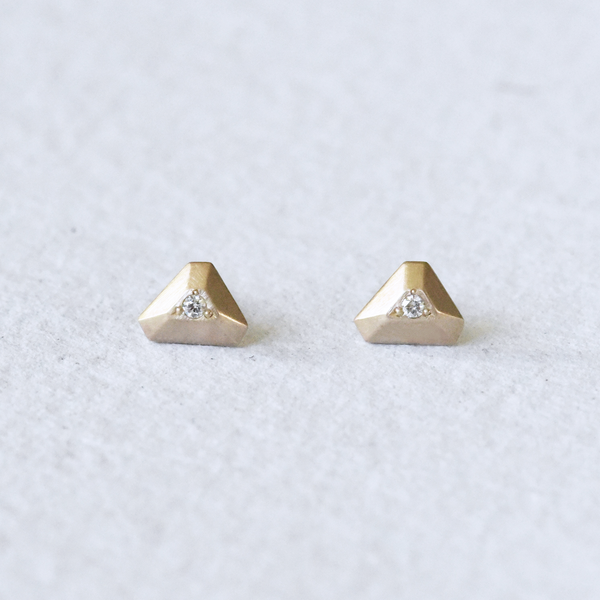 Handcrafted diamond-embellished triangular pyramids, artfully faceted with care. BY Corkie Bolton Jewelry.