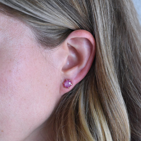 Pink sapphire stud earrings in 18k yellow gold by Corkie Bolton Jewelry.