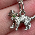Video of  mid-century Beaucraft sterling silver kitten charm showing a green diamond detail.