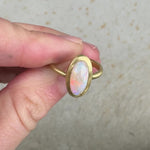 Australian opal 18k yellow gold ring with accent diamond by Corkie Bolton Jewelry.