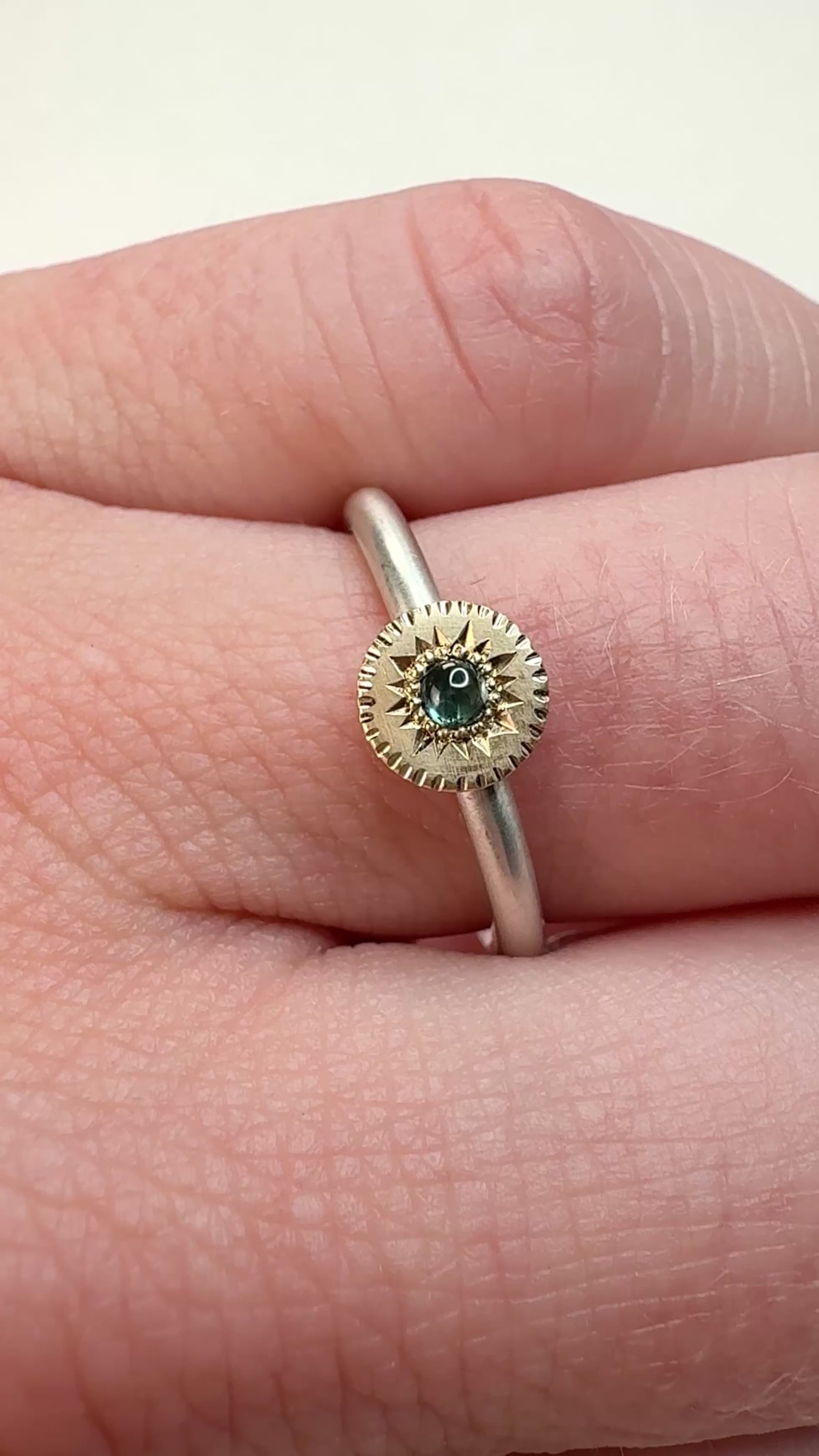 Video of the Engraved Sapphire Ring on a hand. Showing off the hand engraved details.