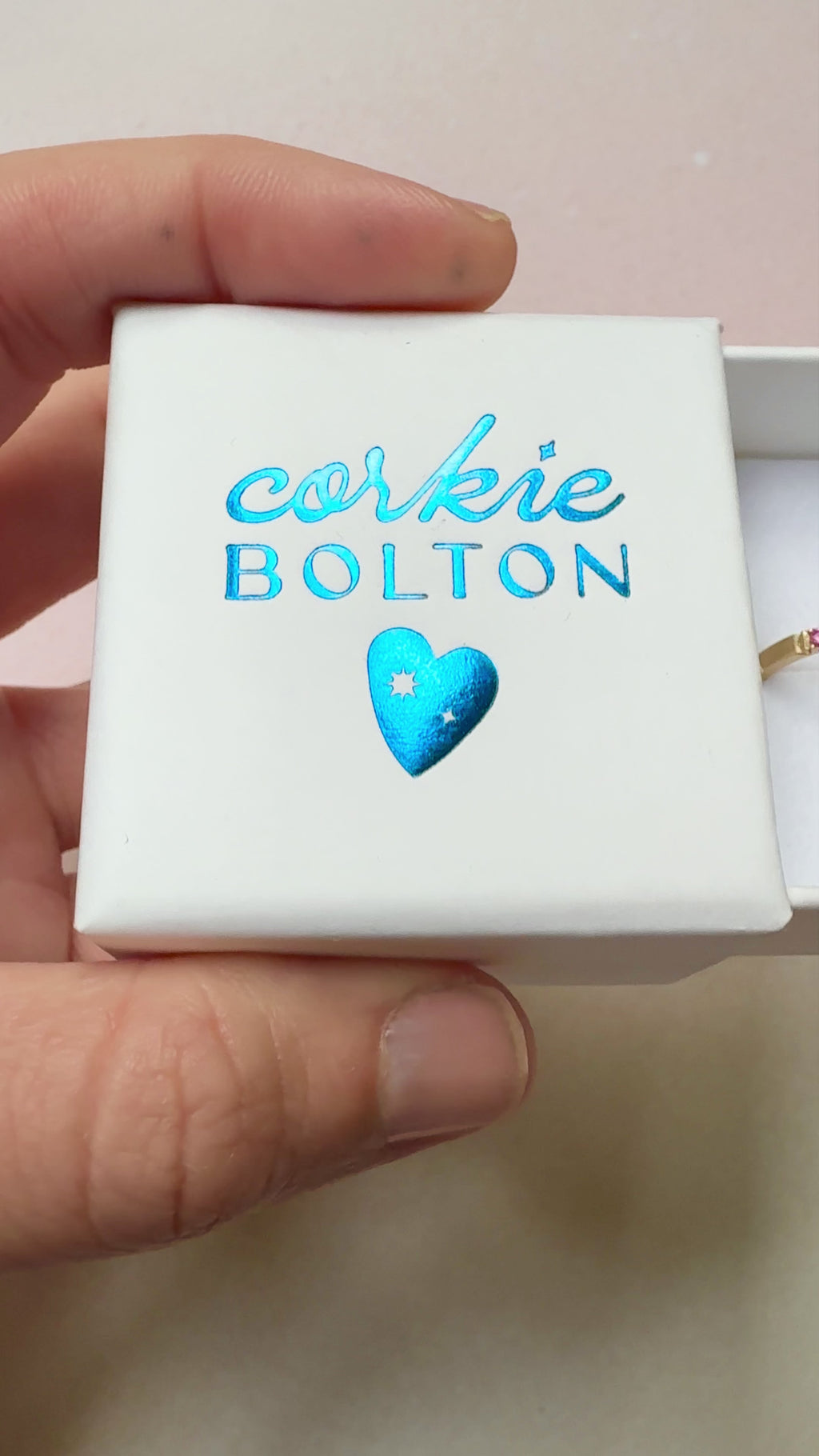 Corkie Bolton Jewelry Ring Box with a Montana Sapphire and diamond engraved 10k ring.