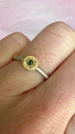 Video of Engraved Starburst Silver and 14k Gold Sapphire Ring rotating under natural light, showing the star-set sapphire and fine hand engraving by Corkie Bolton Jewelry.