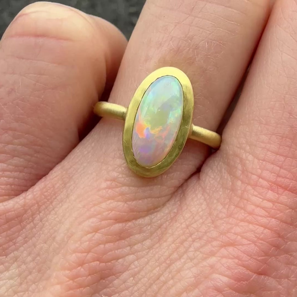 Video of Australian Opal statement ring in recycled 18k yellow gold.