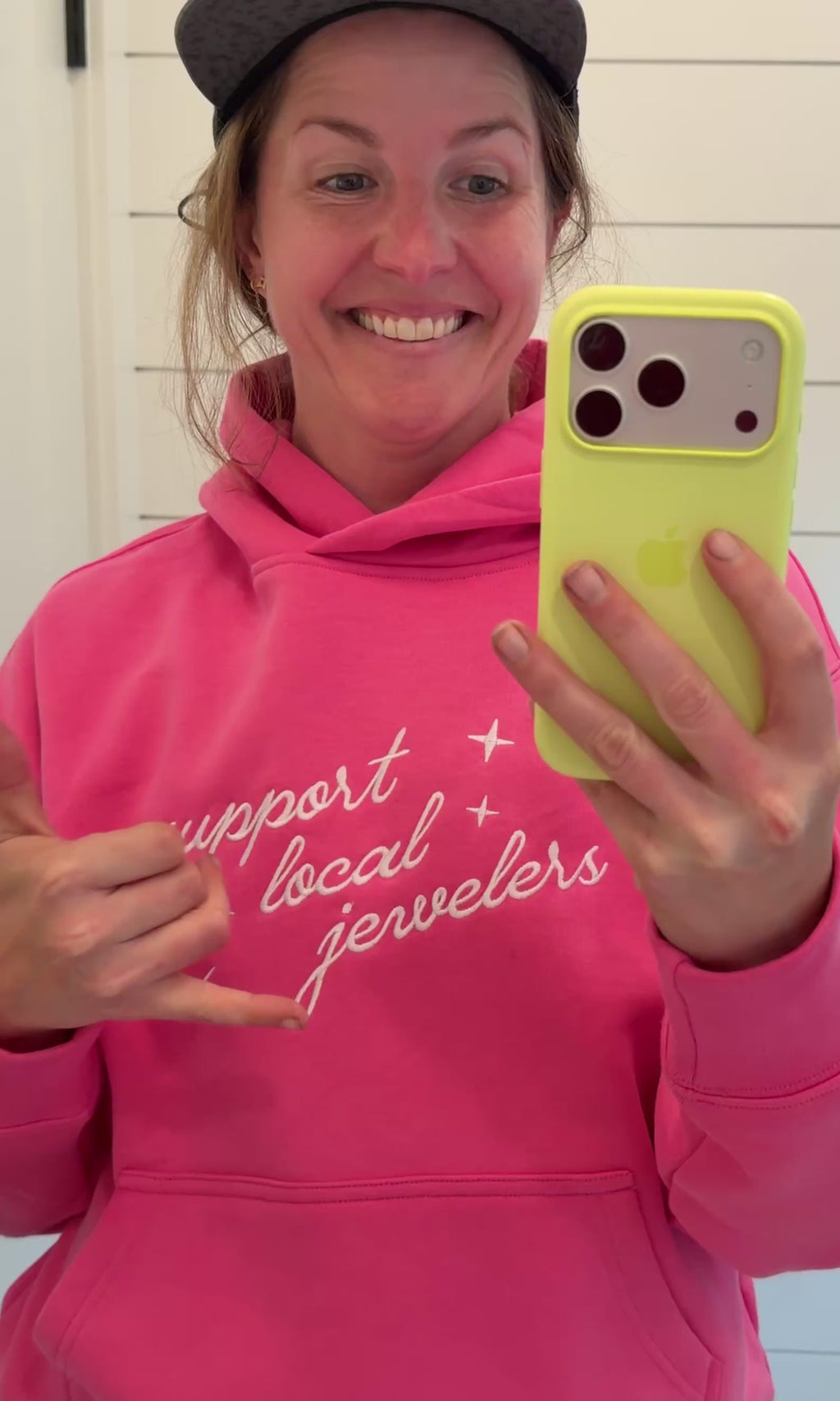 Video of jeweler Corkie Bolton wearing the hot pink Misfit hoodie.