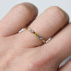 18k yellow gold ring with a rainbow of sapphires and diamonds. Matte finish. By Corkie Bolton Rhode Island Jeweler.