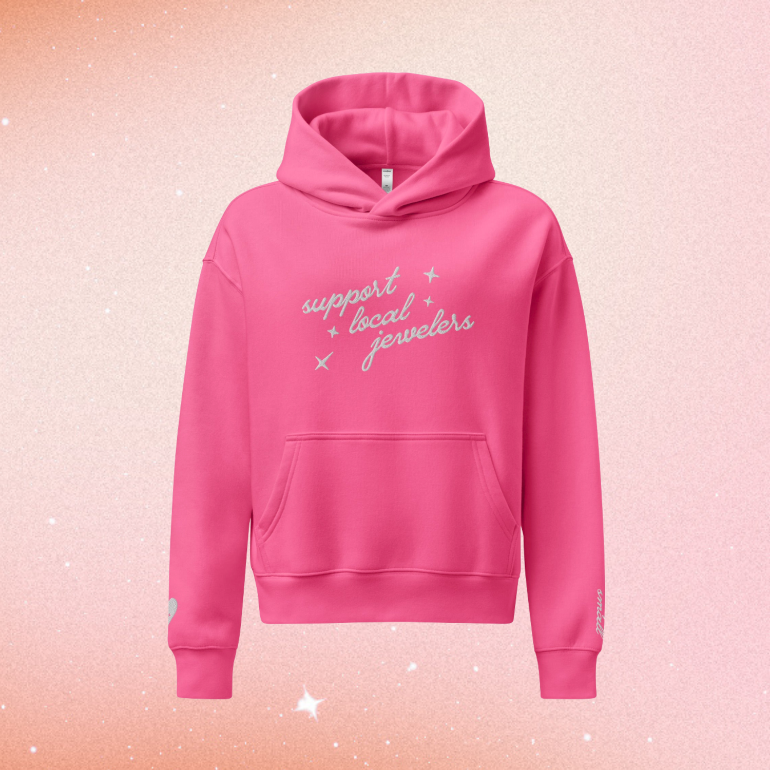 Women’s luxury Support Local Jewelers hoodie in Charity Pink with sparkling embroidered “Support Local Jewelers” text on the front, relaxed fit heavyweight fleece pullover