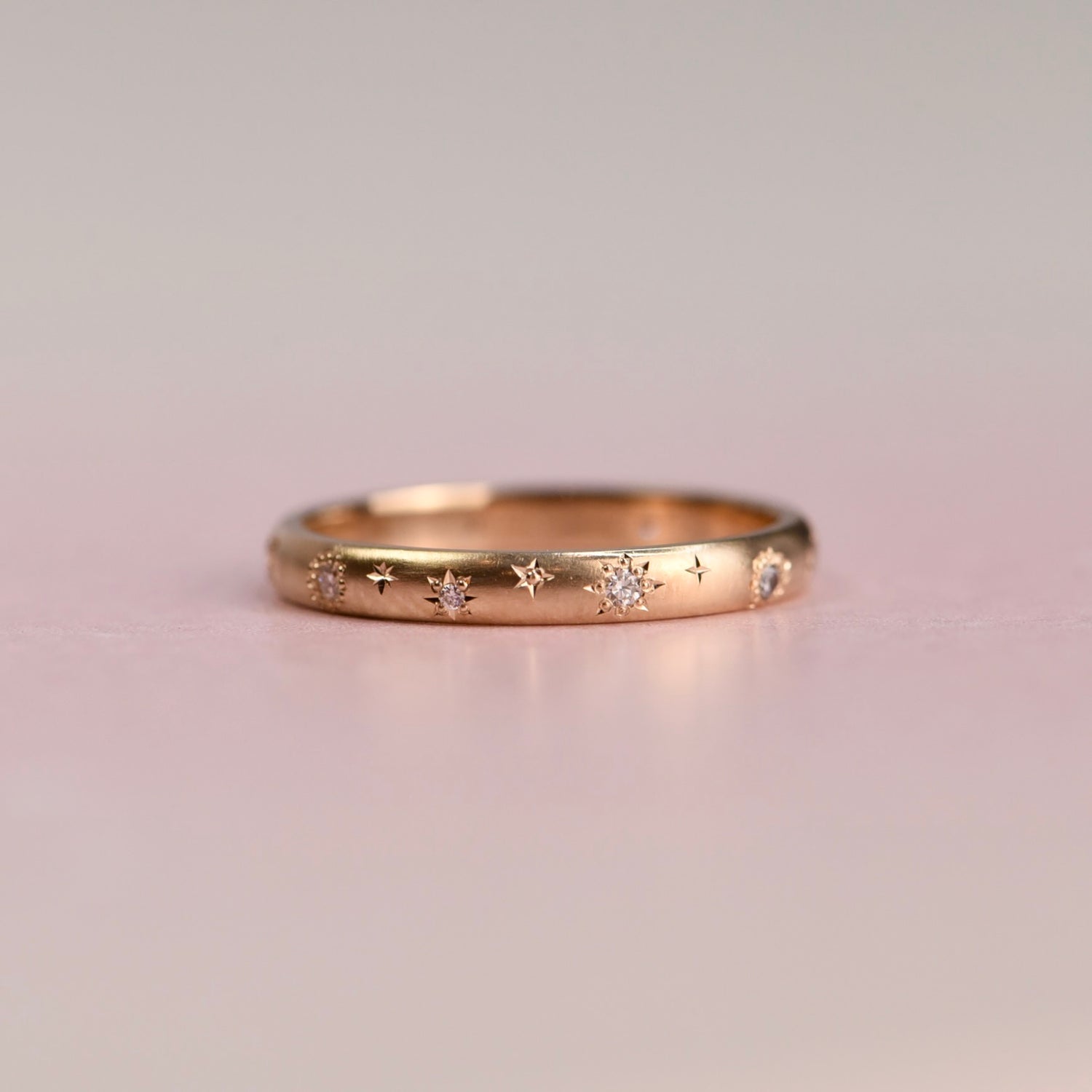 Vintage 14k gold Jabel ring reimagined by Corkie Bolton Jewelry as a celestial diamond band featuring star-set Canadian diamonds, size 8.25.