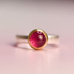 Vintage sterling silver ring engraved “for my mother” set with a pink tourmaline cabochon in an 18k yellow gold bezel