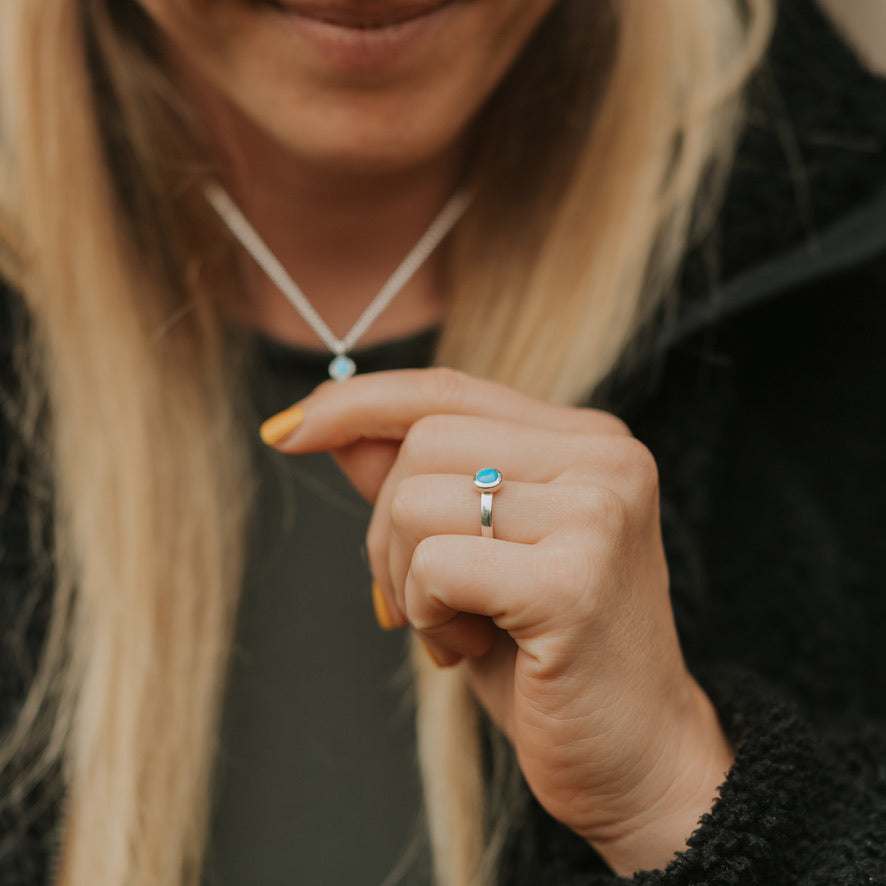 This gorgeous ring features a 6mm sleeping beauty turquoise, set in sterling silver Size 6.25.
