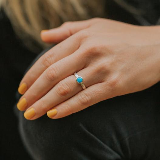 This gorgeous ring features a 6mm sleeping beauty turquoise, set in sterling silver Size 6.25.