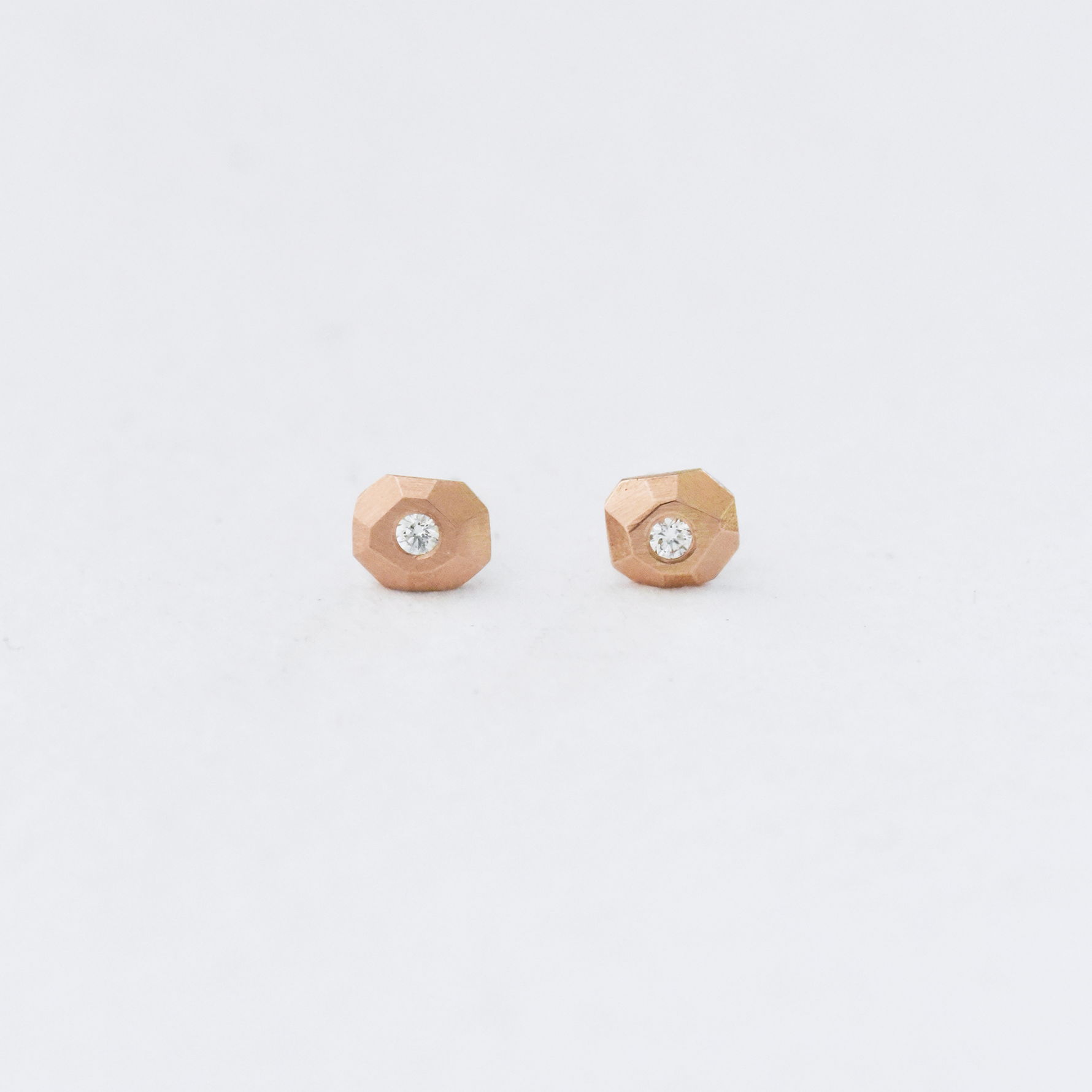 ROSE GOLD FACETED DIAMOND STUDS BY CORKIE BOLTON JEWELRY