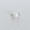Silver signet ring with a flower. 