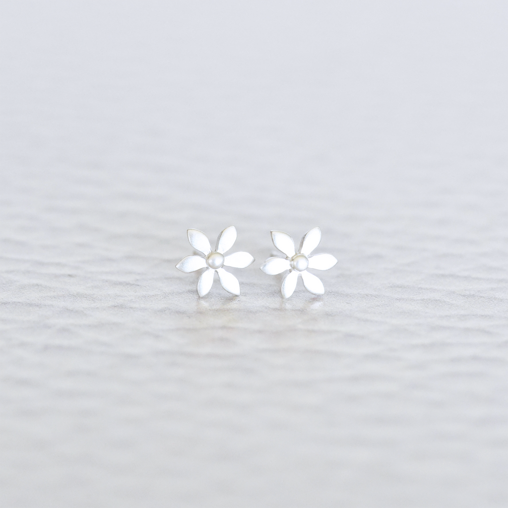 Put spring in your step with these adorable silver wildflower stud earrings! 
